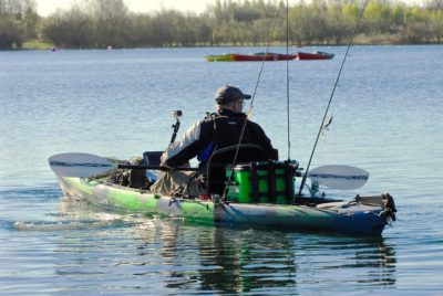 Fisherman With Kayak Fishing Accessories